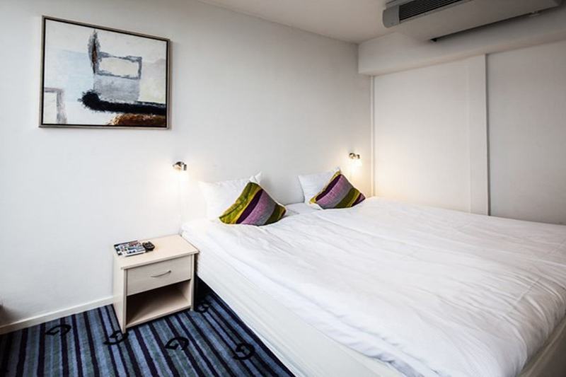 Manon Les Suites Guldsmeden Kodaň Exteriér fotografie A bedroom at the hotel